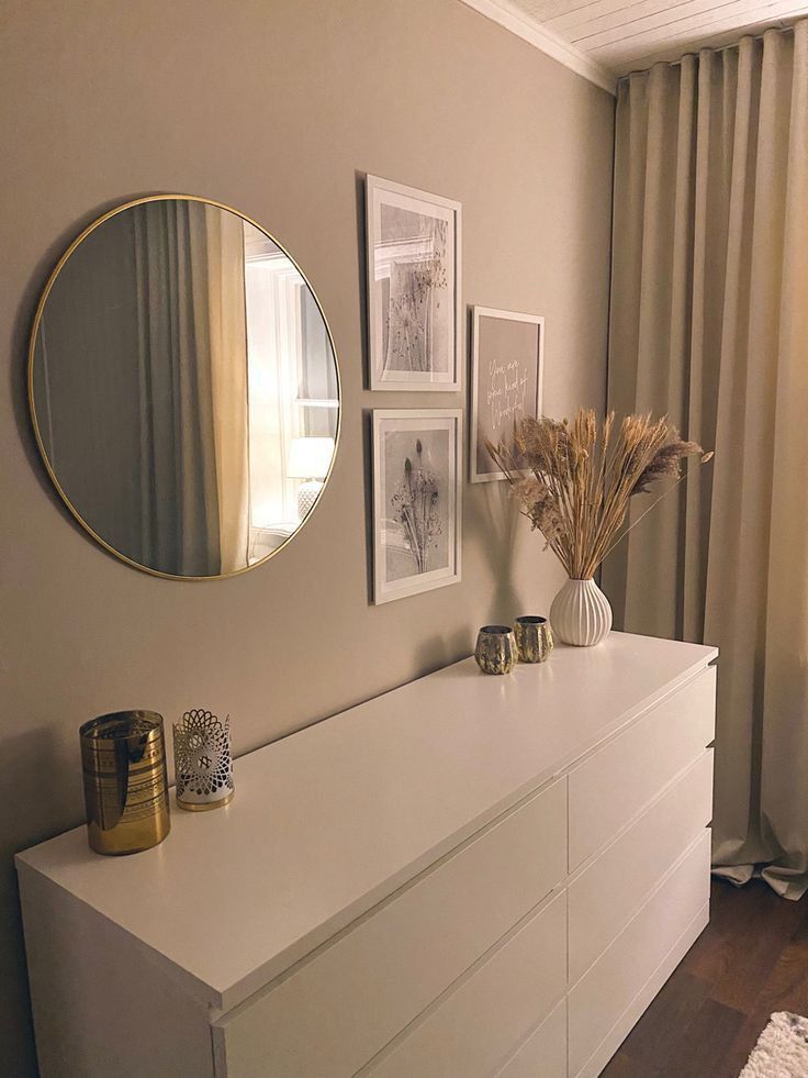 Round Gold-Framed Wall Mirror