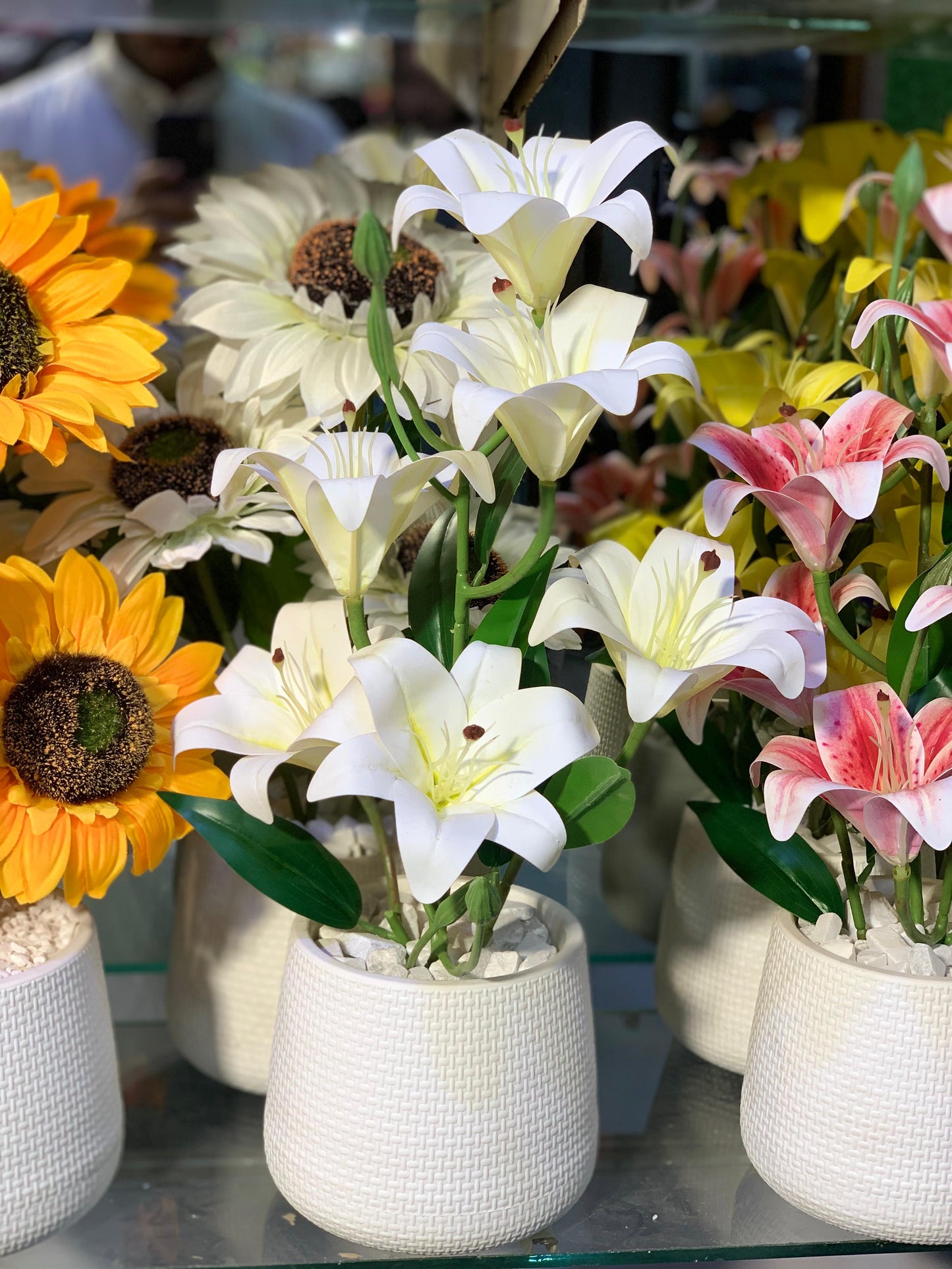 White Textured Planters with Artificial Lily Arrangements